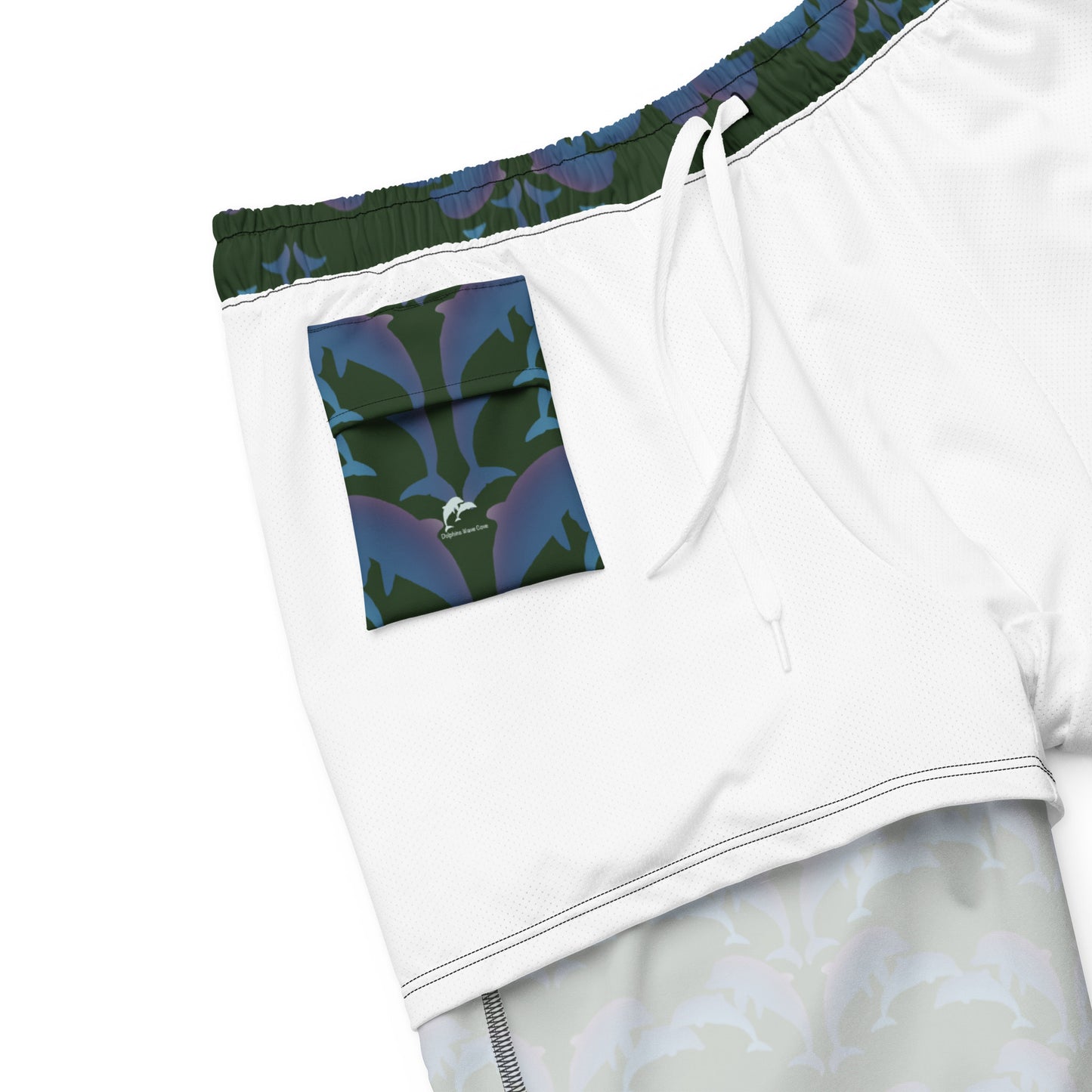 dolphins swim trunks on green