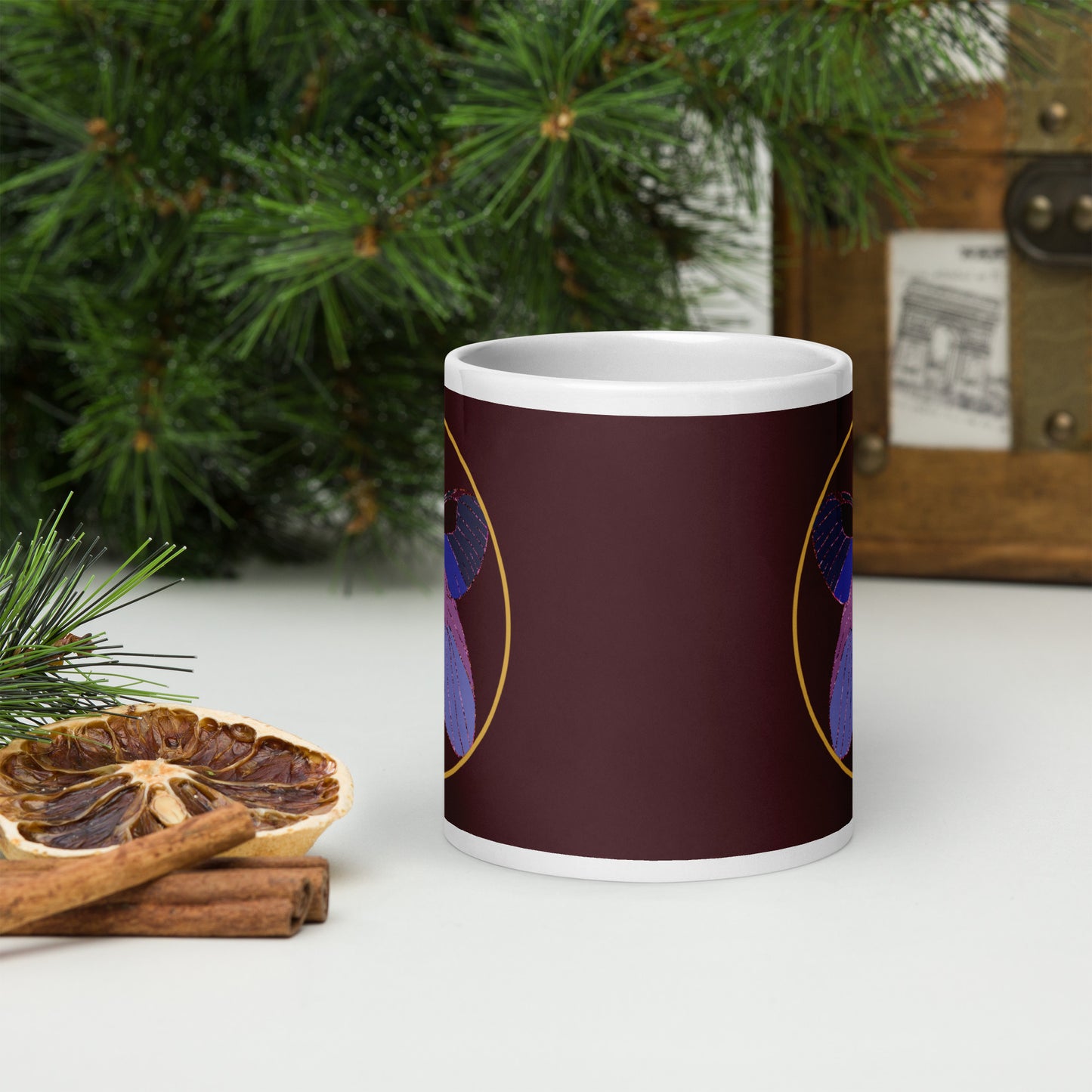 White ceramic mug with an enchanted butterfly with a gold ring on dark background