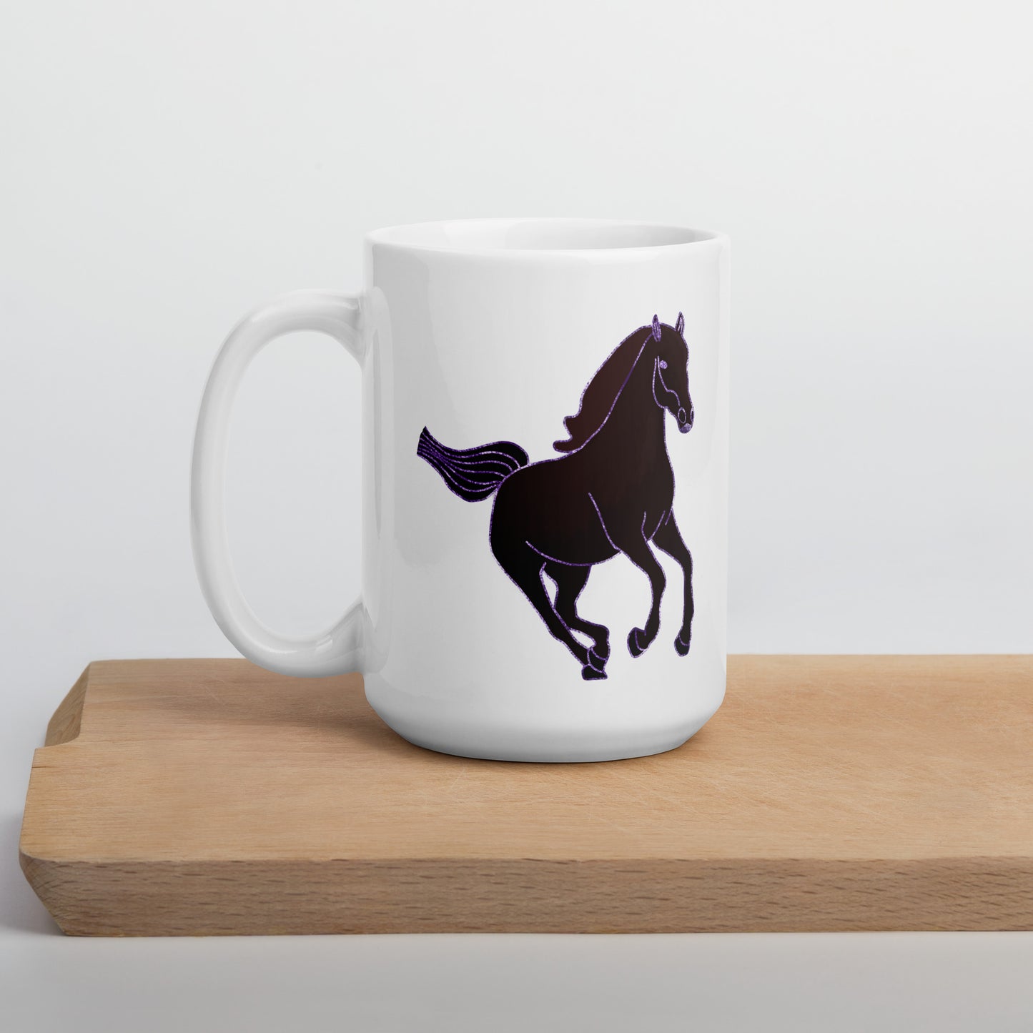 White ceramic Horse Coffee Mug with black horse graphic on wooden surface