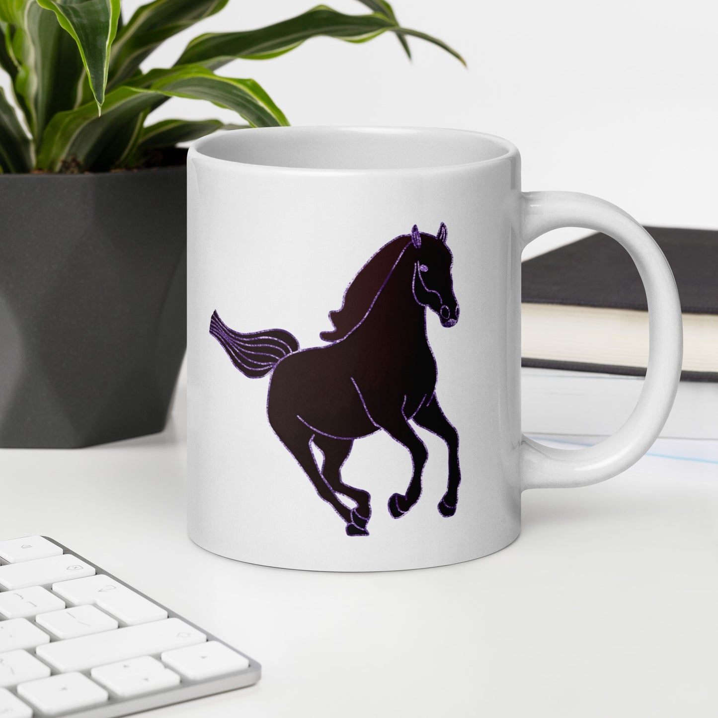 White Horse Coffee Mug with black horse silhouette design on office desk
