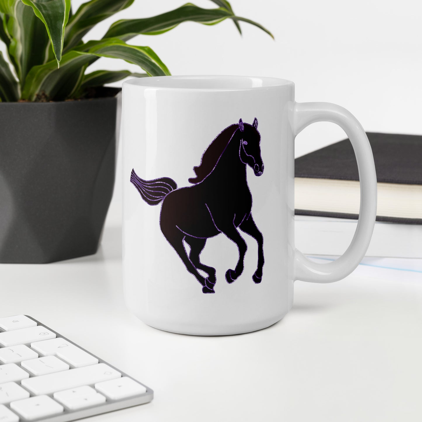 White Horse Coffee Mug with black horse graphic placed on white desk near keyboard and plant