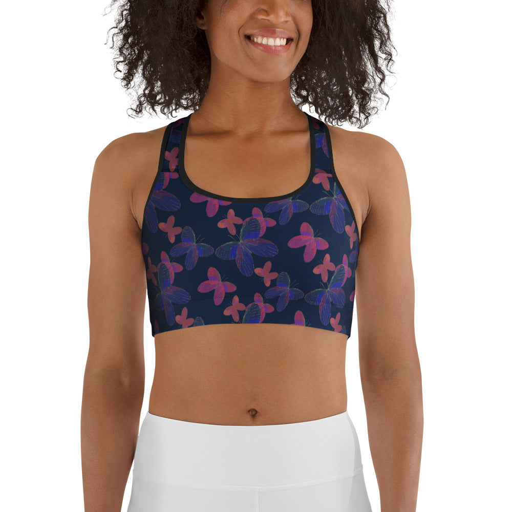 front view of model wearing butterfly sports bra navy