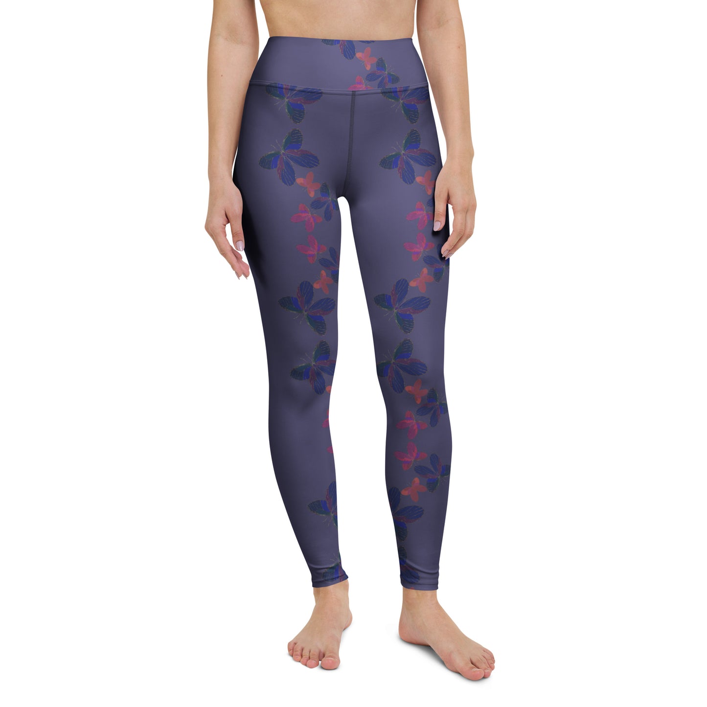 front view of model wearing butterfly yoga leggings in blue