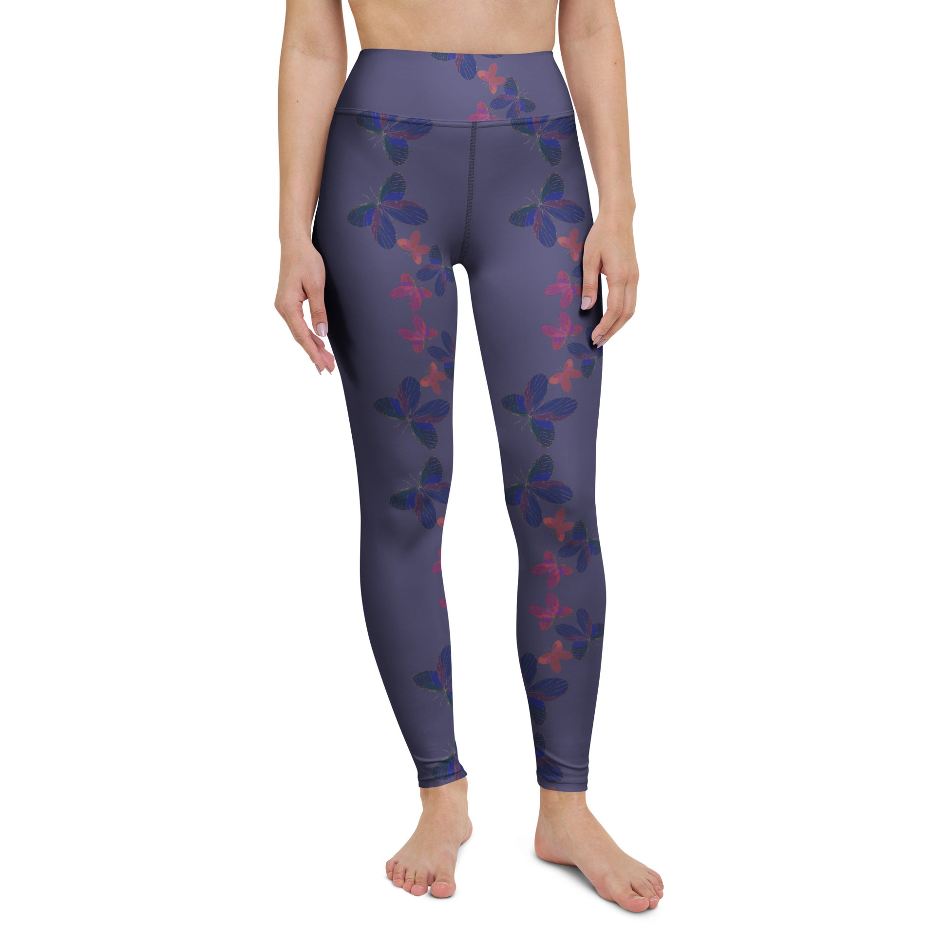 front view of model wearing butterfly yoga leggings in blue