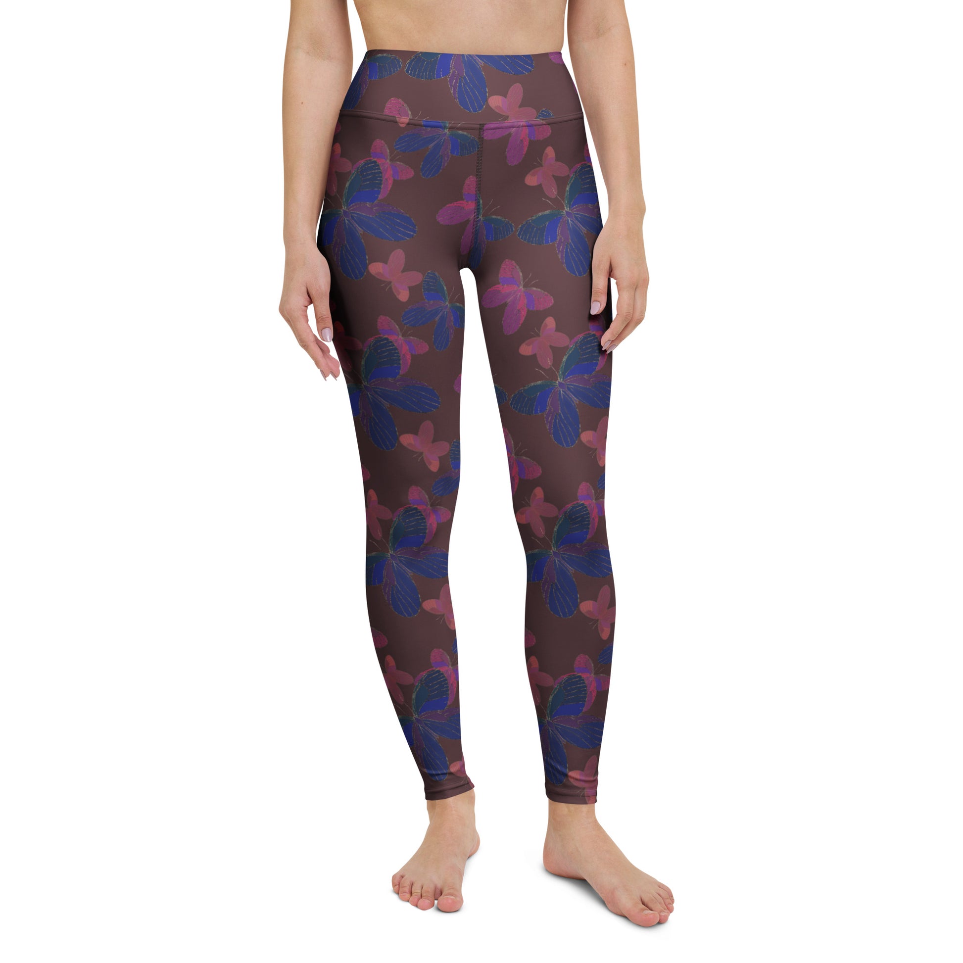 front view of model wearing butterfly yoga leggings in burgundy