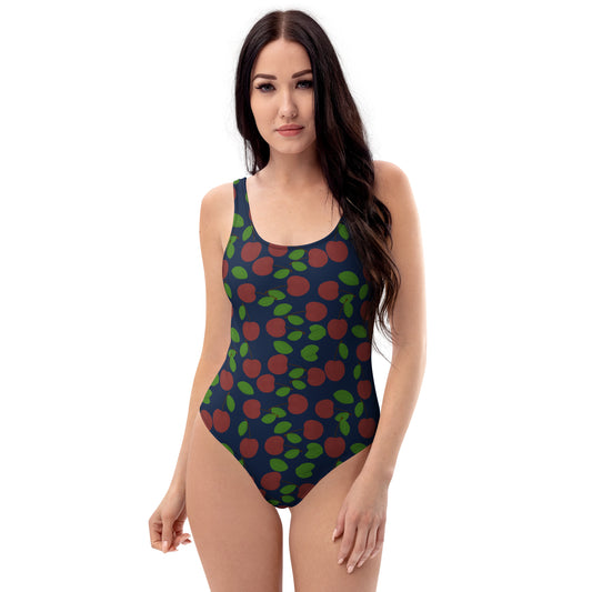 front view of model wearing cherry one-piece swimsuit in navy