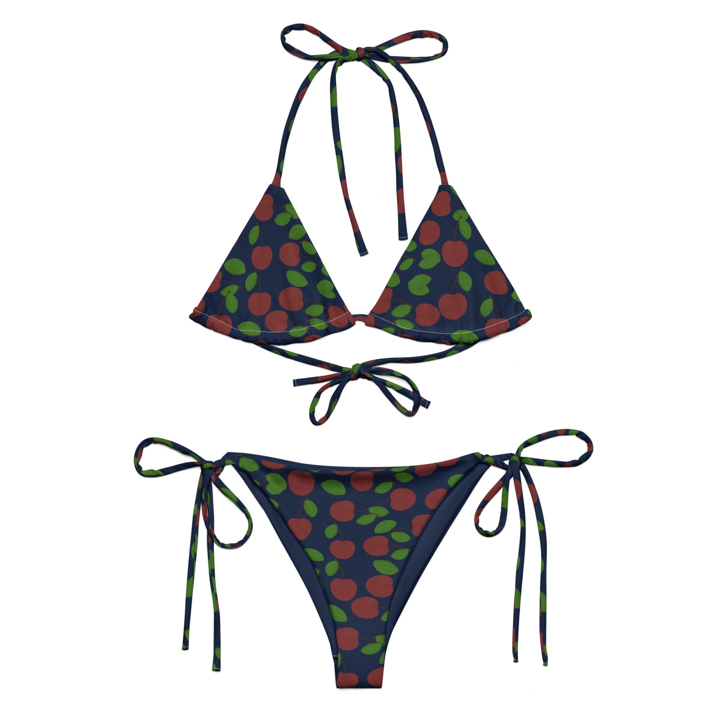front view of model wearing cherry string triangle bikini in navy