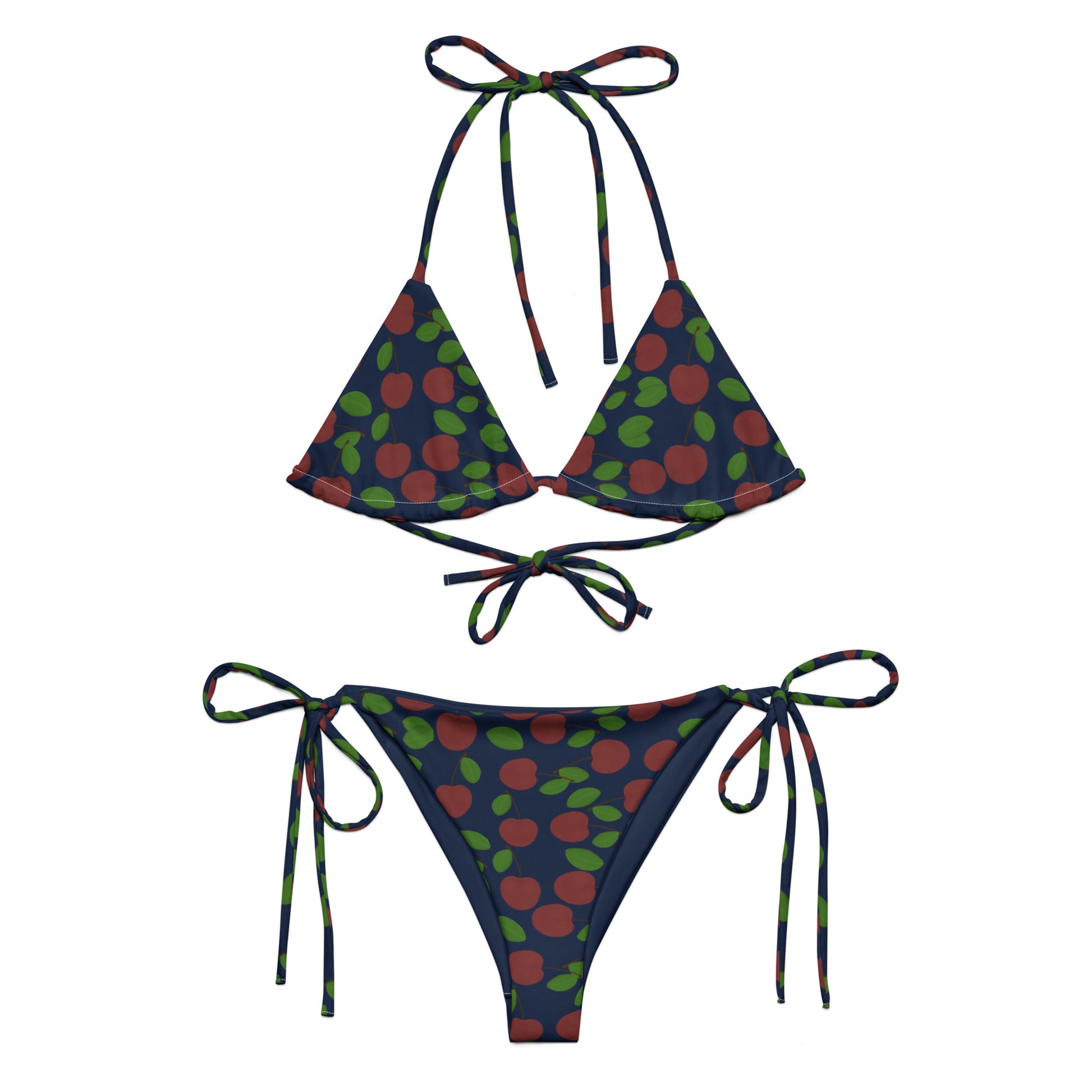 front view of model wearing cherry string triangle bikini in navy