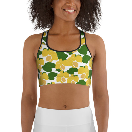  front view of model wearing citrus lemon sports bra in white with black trim