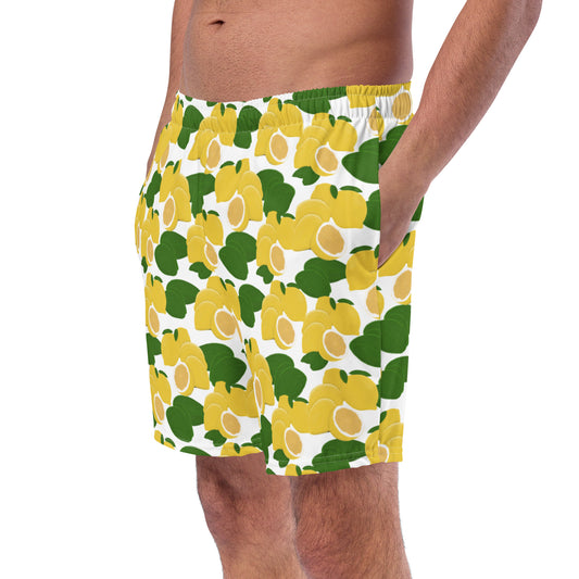 left front view of model wearing citrus lemon swim trunks