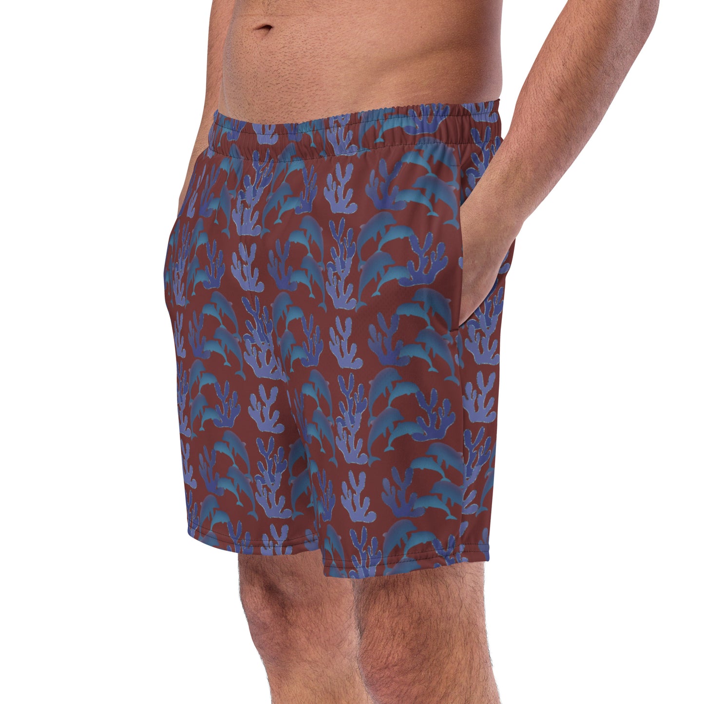 left front view of model wearing coral reef dolphins swim trunks in burgundy