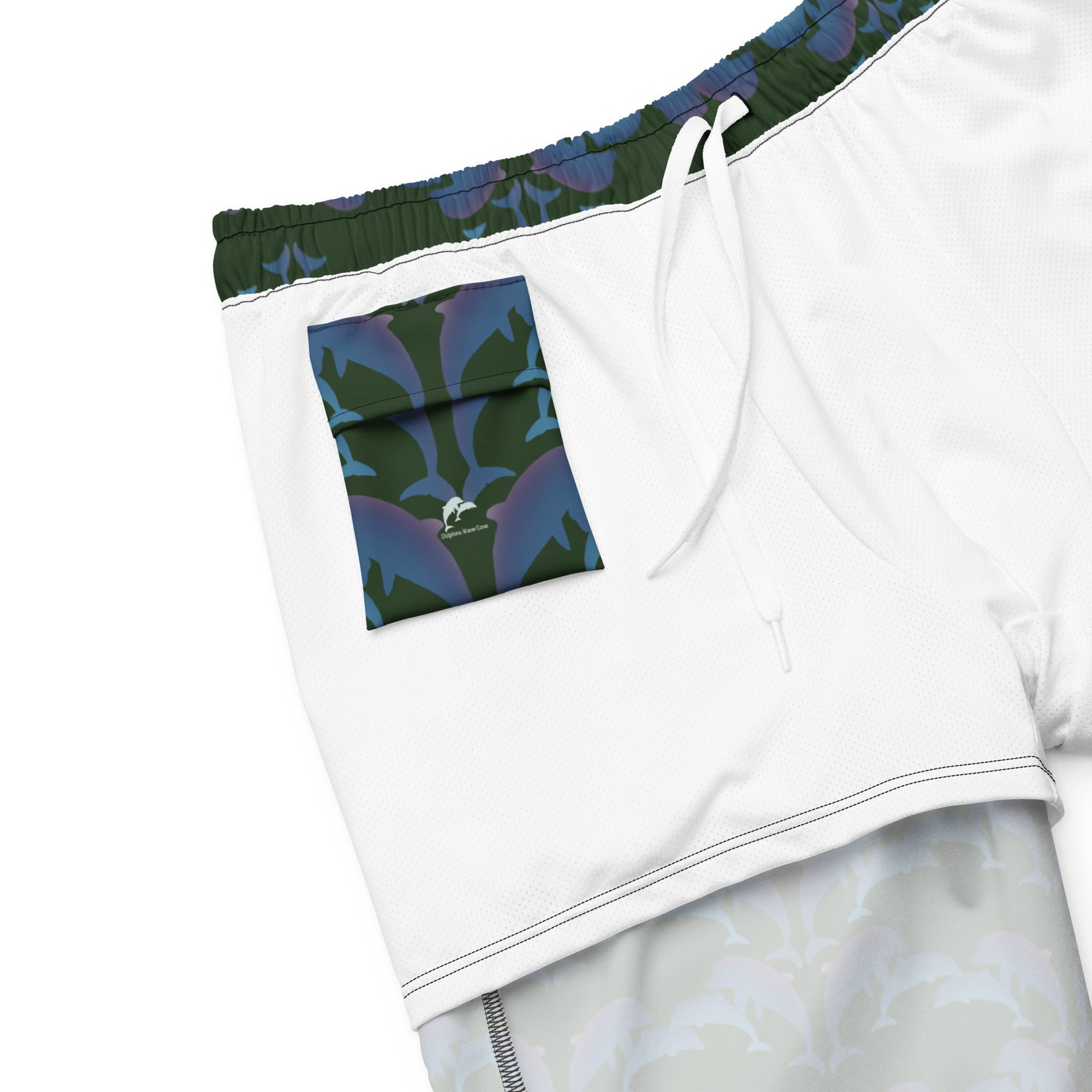 dolphins swim trunks on green