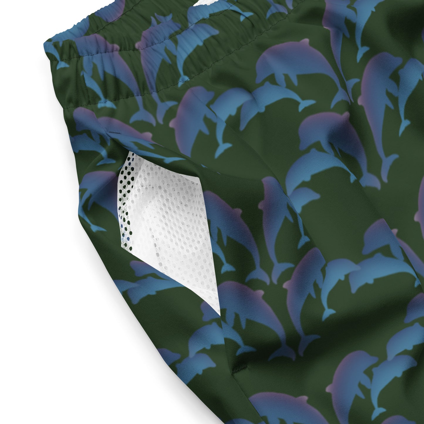 dolphins swim trunks on green