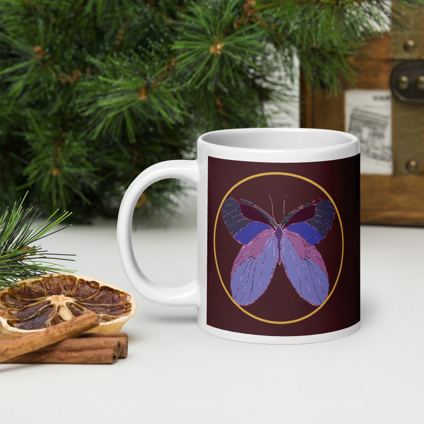 White ceramic mug with an enchanted butterfly with a gold ring on dark background 