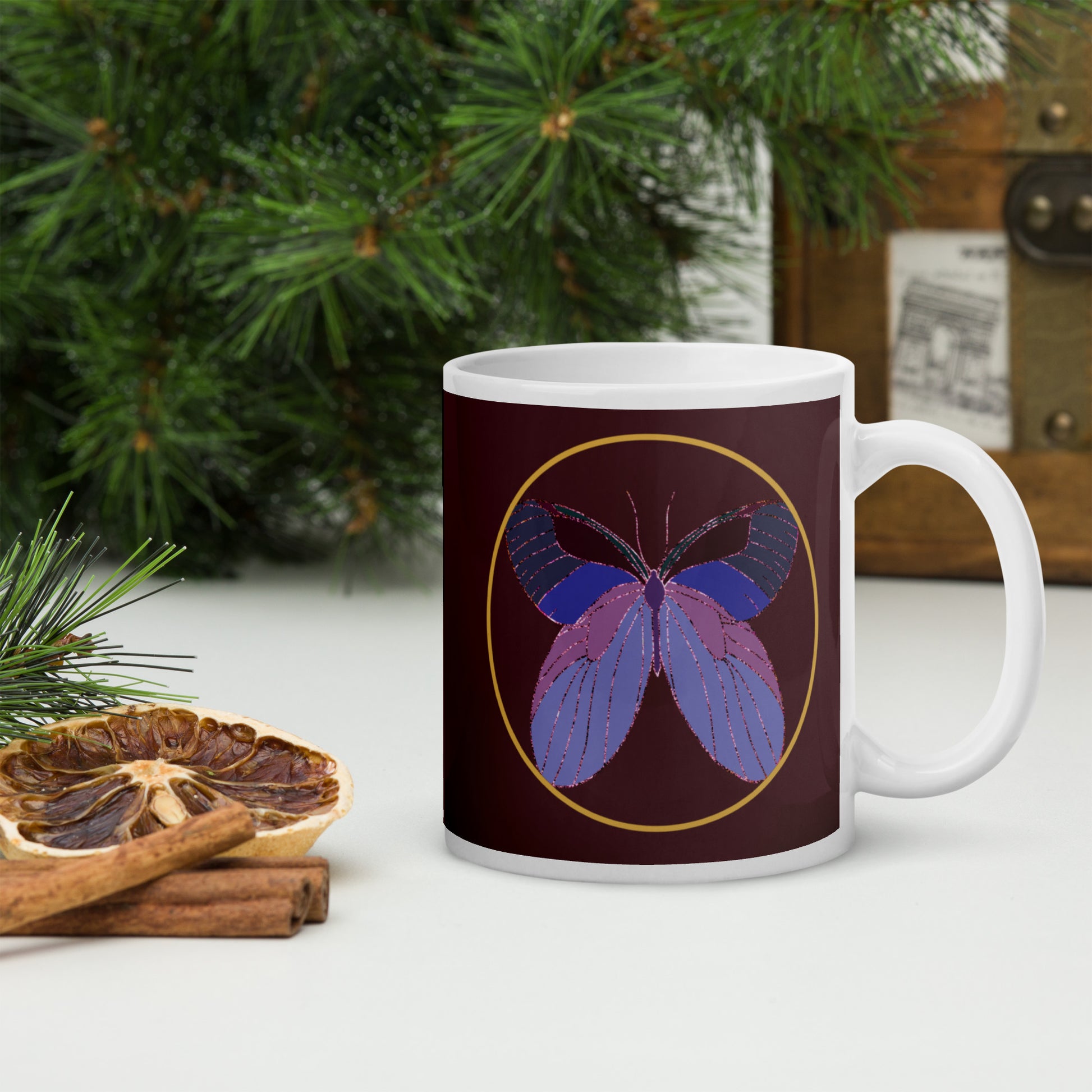 White ceramic mug with an enchanted butterfly with a gold ring on dark background 