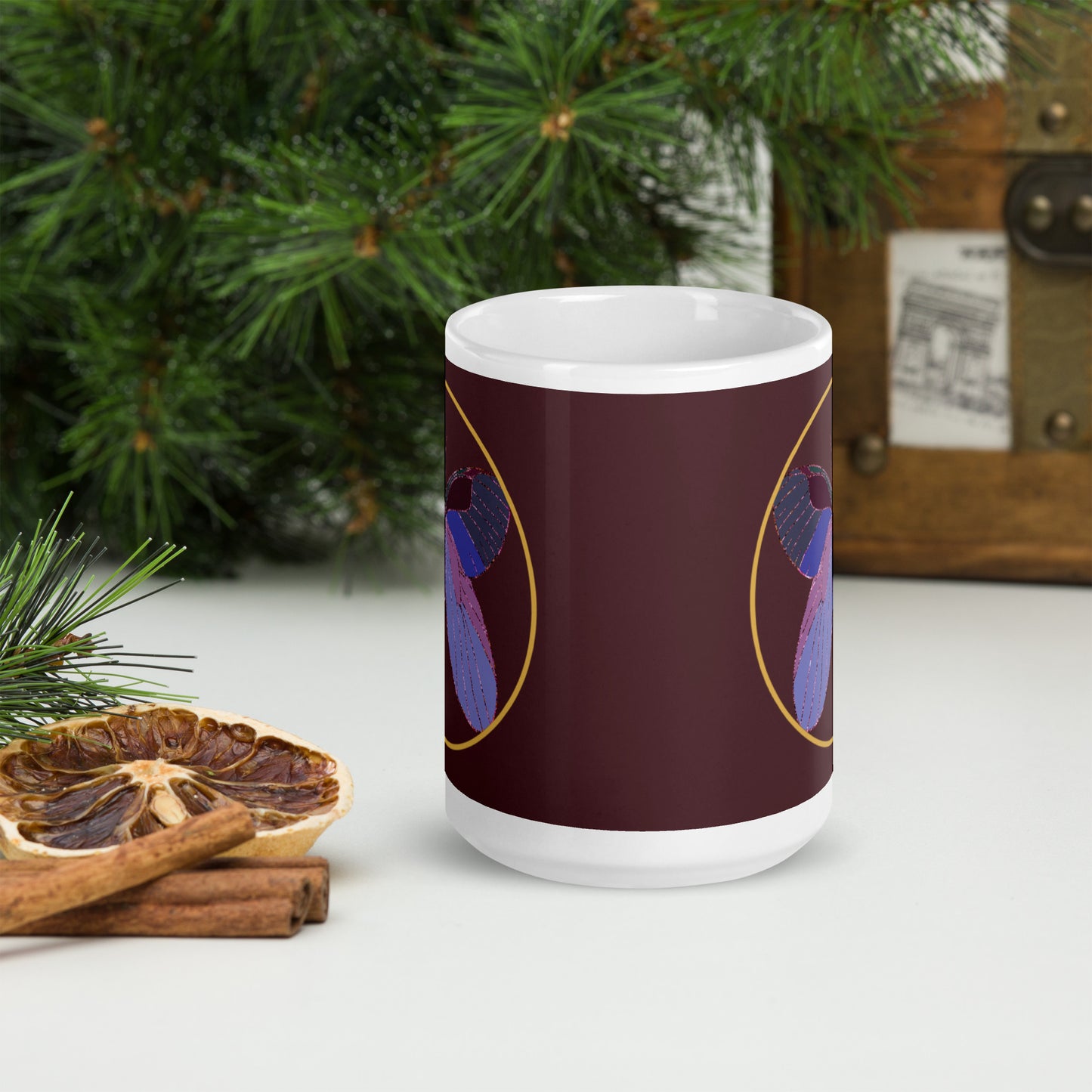 White ceramic mug with an enchanted butterfly with a gold ring on dark background 