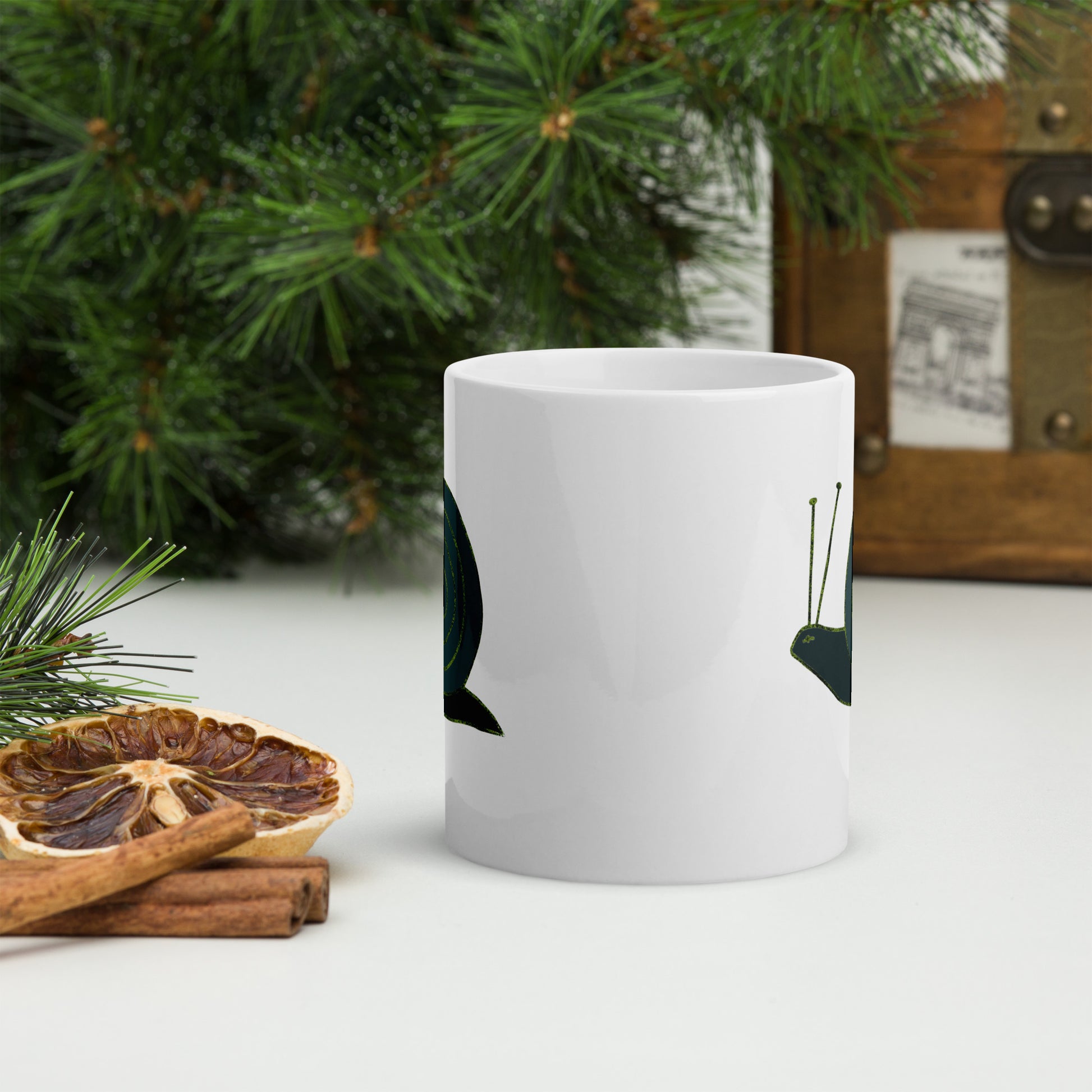 Snail coffee mug featuring a whimsical snail design with a spiral shell