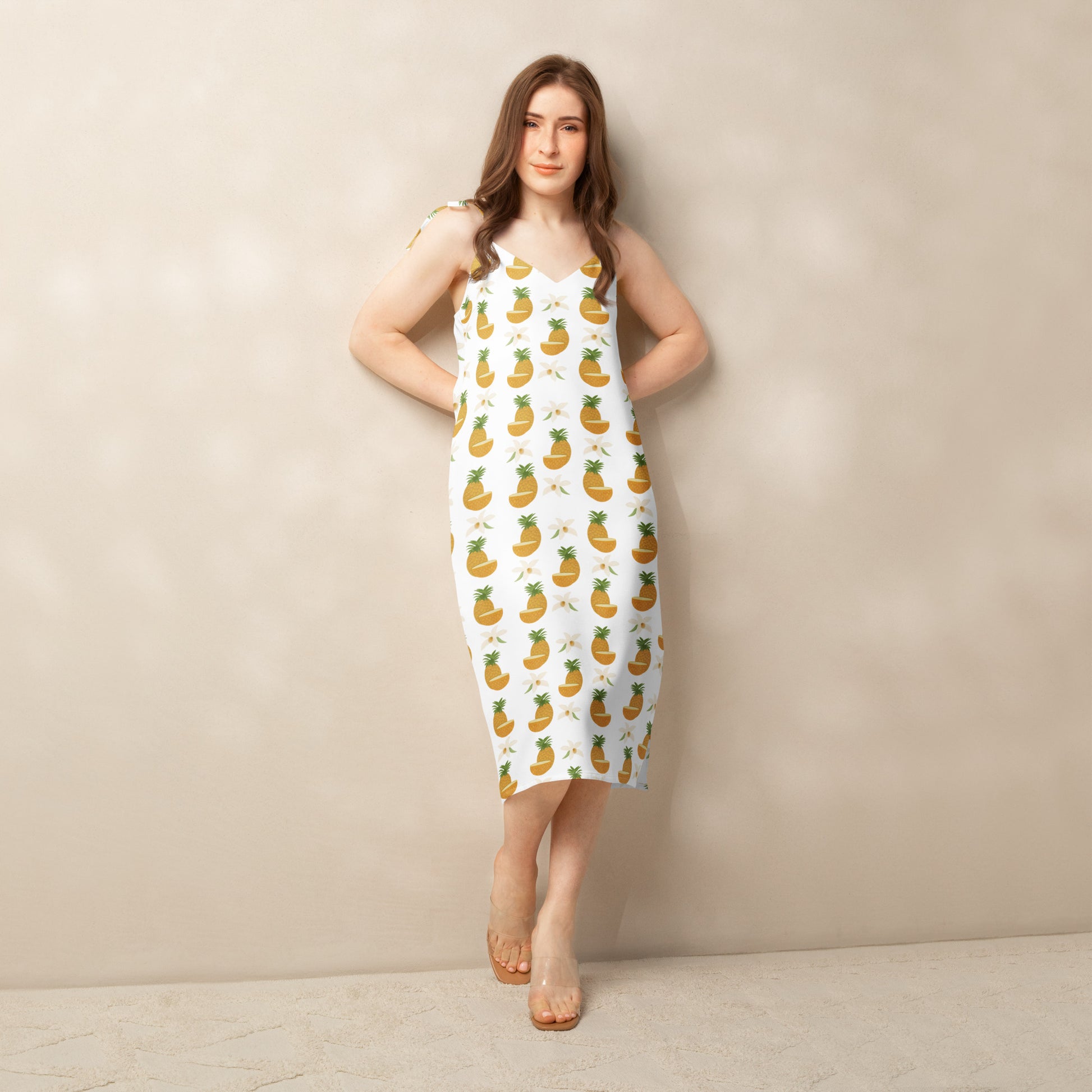 front view of model wearing tie-strap pineapple beach dress 